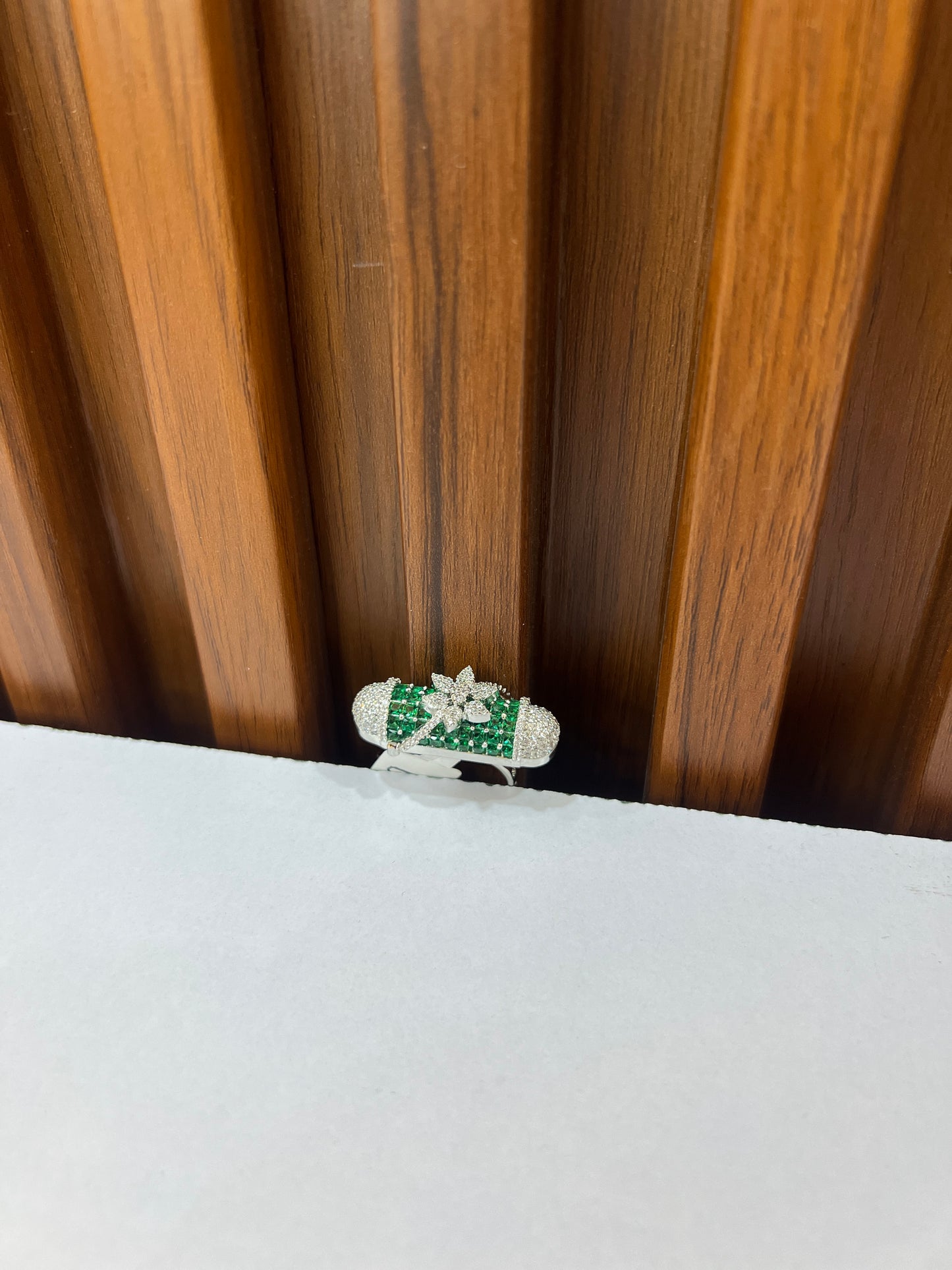 Emerald Sparkle Ring with Floral Accent